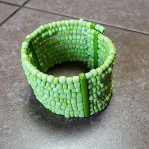 Green beaded bracelet.